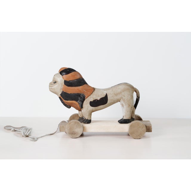 Folk Art Early 20th Century Hand-Carved Painted Wood Lion Pull Toy on Wheeled Platform For Sale - Image 3 of 17
