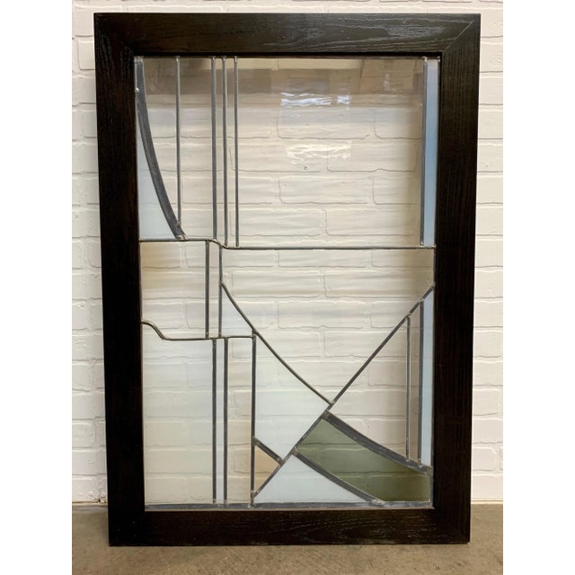 Studio crafted stained glass abstraction. A combination of wavy clear, smoked and milky glass. This piece has been custom...
