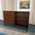 This American-Made Mid-Century Modern bookcase with secretary desk is by furniture maker Heywood-Wakefield. The model is...