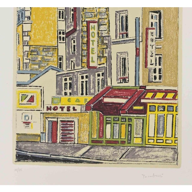 Parisien Café is a Modern artwork realized by Orfeo Tamburi (Jesi, 1910 – Paris,1994) in the 1970s. Colored Lithograph....