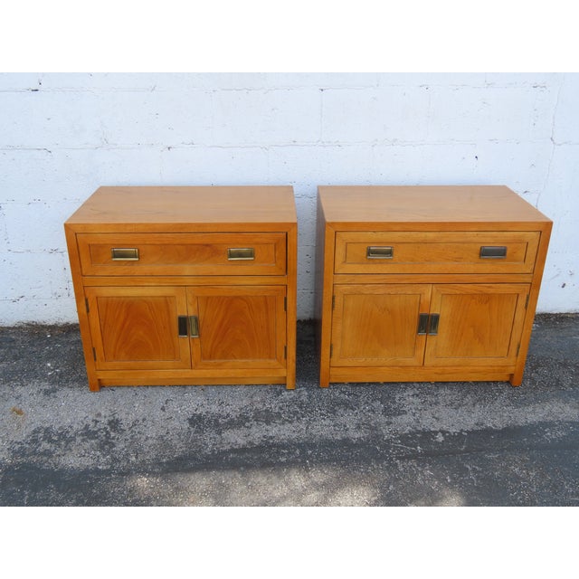 This Pair of Nightstands is made of wood, solid wood, oak veneer, and metal. The Nightstands were made by Thomasville...