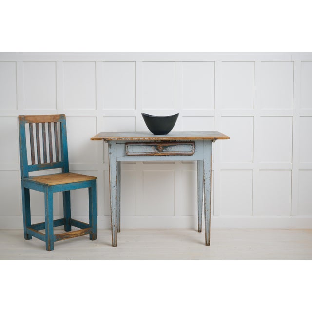 Antique Swedish country table in gustavian style from northern Sweden. The table is a genuine country house furniture from...