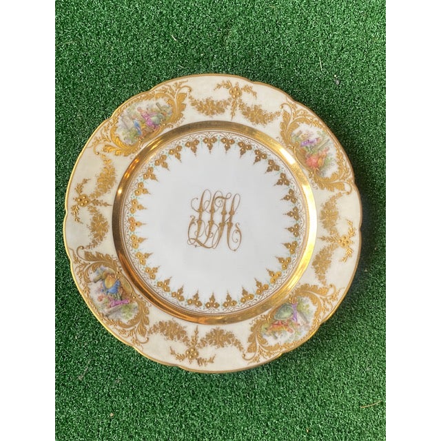 Set of 12 Rococo Revival, late 19th century to early 20th German hand-painted porcelain dinner plates by renowned artist...