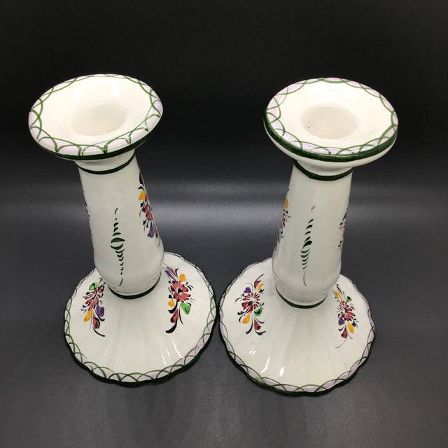 Add a touch of European charm to your home with this beautiful pair of hand-painted taper candle holders from Portugal....