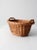 This vintage woven harvest basket adds a rustic touch to any home. Woven in an oval shape with braided detailing, it has...