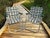 A wonderfully nostalgic pair of vintage RIO Backyard Collection aluminum webbed patio chairs, featuring an exceptionally...