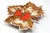 A vintage, ceramic bowl by Dryden Pottery, in the form of a large maple leaf. It is decorated with a classic drip glaze in...