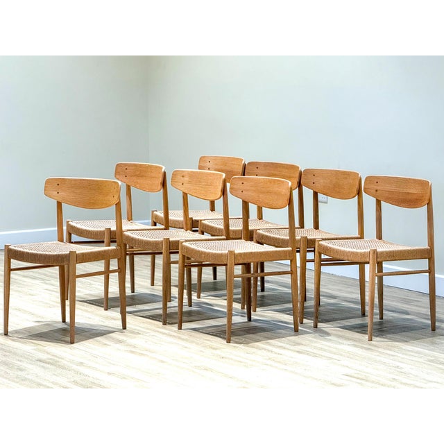 A harmonious quartet by A.M. Møbler, these Model 501 chairs embody the enduring language of Mid-Century Danish...