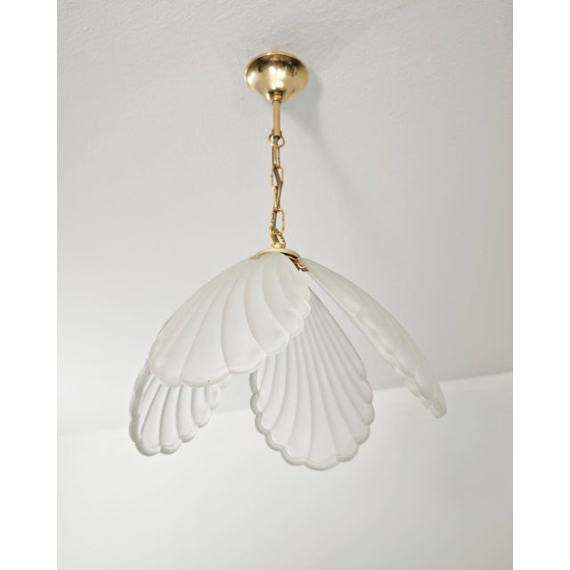 Vintage Italian chandelier in frosted glass and gold-plated metal dating back to the 1970s. Composed of four...