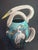 I’m selling an unusually shaped tall Raku pottery vase. It is signed underneath as shown by listed artist Robin Duke...