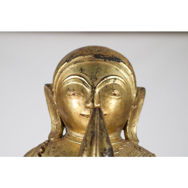 Adorant in papier maché, lacquered and gilded. Myanmar (Burma), Shan, 18th century. Although it has several cracks, the...