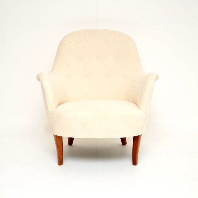 A stylish and iconic vintage Swedish Cirkus armchair by Carl Malmsten. It was made in Sweden, it dates from around the...