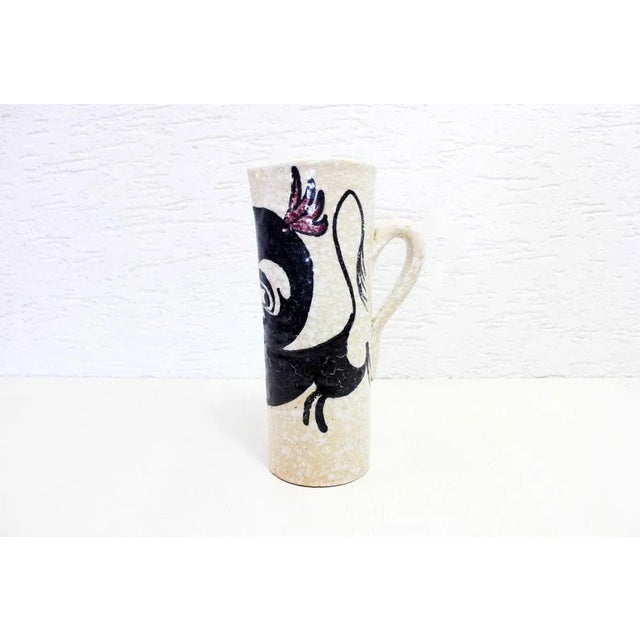 Nice ceramic vase 70s signed Porto Cristo. Ideal for accommodating medium-sized bouquets, this ceramic vase will quickly...