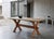 Rectangular dining table in solid oak, attributed to Danish designer Henning Kjærnulf and produced in Denmark during the...