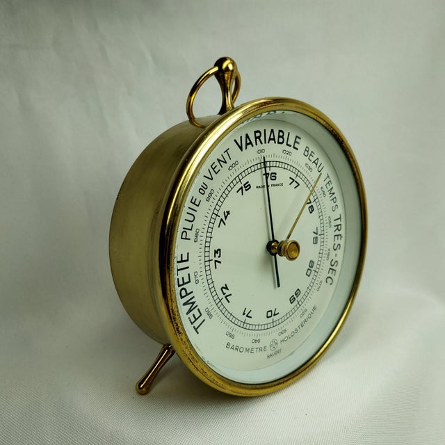 Holosteric barometer to hang or stand. This is the version with a white dial, double scale, and inscriptions "Made in...
