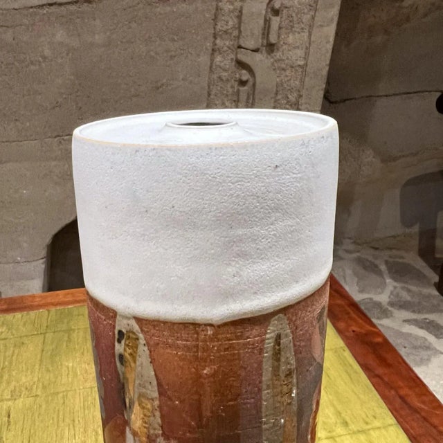 AMBIANIC presents 1970s Sculptural Art Pottery Vase Color Splash Initialed at bottom. 12.75 h x 3.5 Original vintage...