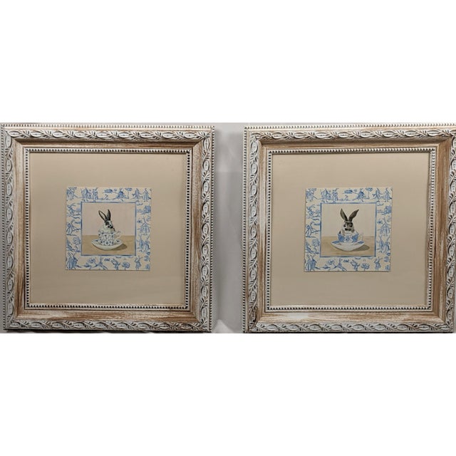 Charming matched pair from the “Teacup Bunny” series by Kari Phillips, each featuring a whimsical rabbit composition...