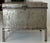 A distinctive antique industrial steel trunk/chest raised on a simple metal stand, retaining its original aged finish and...