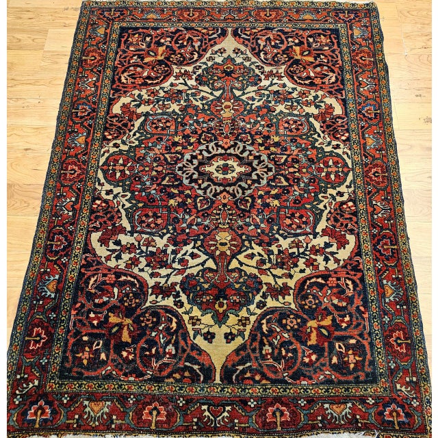 "This 19th century Persian Farahan Sarouk area rug exemplifies the refinement and artistry of late 19th century Persian...