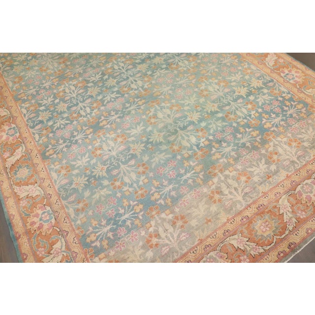 A small room size indian amritsar rug in feminine colors from the 2nd quarter of the 20th century