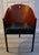 Replica of Phillipe Starck dining chair in mahogany color wood and black leather seat cushion, mid 1980’s. Excellent...