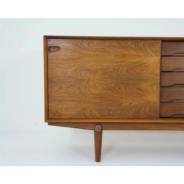 Sideboard in rosewood by Danish designer Egon Kristensen for Skovby Møbelfabrik. This well-built sideboard features two...