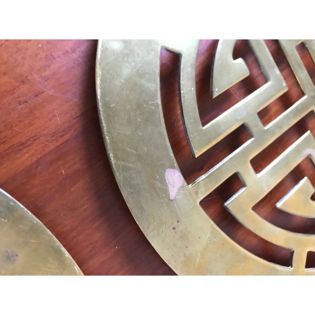 Mid-Century Modern A Pair of Brass Trivets With Chinese Shou Symbol of Longevity. For Sale - Image 3 of 5
