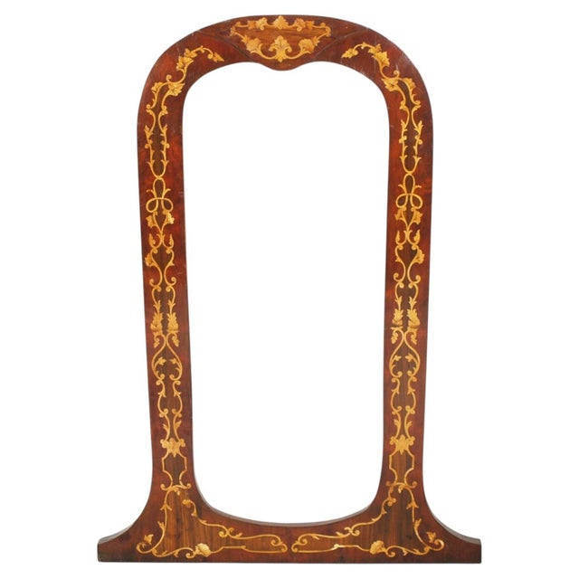 An elegant Venetian-style mirror distinguished by its graceful arched silhouette and exceptionally refined marquetry...