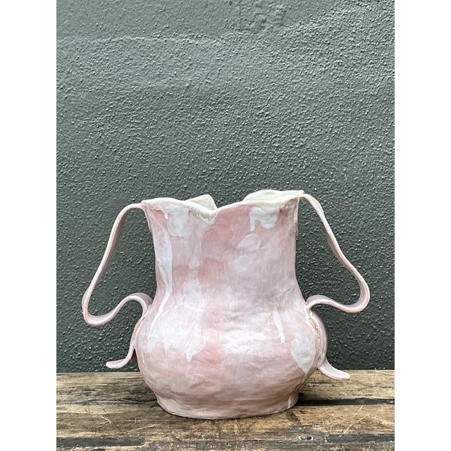 This captivating studio pottery vase is a masterclass in organic form, featuring a unique slab-built construction that...