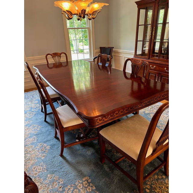Beautiful cherry, double pedestal, rectangular , 74" dining room table with (3) 18" leaves for a full extension to 128"....