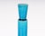A Rörstrand Sweden blue ceramic bottle with stopper. The blue glazed decanter features a narrow neck and oblong body with...