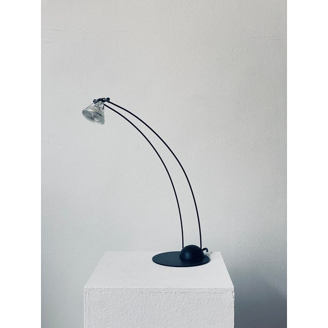 Postmodern, minimalist design that blends perfectly with any style. Currently equipped with an LED reflector bulb that...