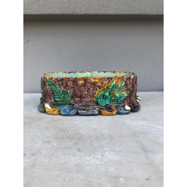 19th Century Majolica Palissy Jardiniere signed Thomas Sergent. Decorated with a frog, a fish, a lizard, shells and plants.