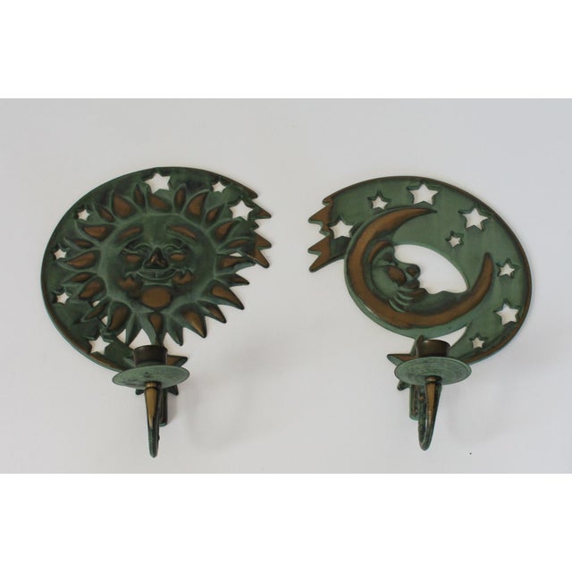 Vintage brass sun, moon & stars candle wall sconces. Made in Taiwan. Dated 1994. Minor age wear.