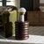 Introduce a touch of timeless elegance into your living space with the Anatoly Round Accent Table in brown. This charming...