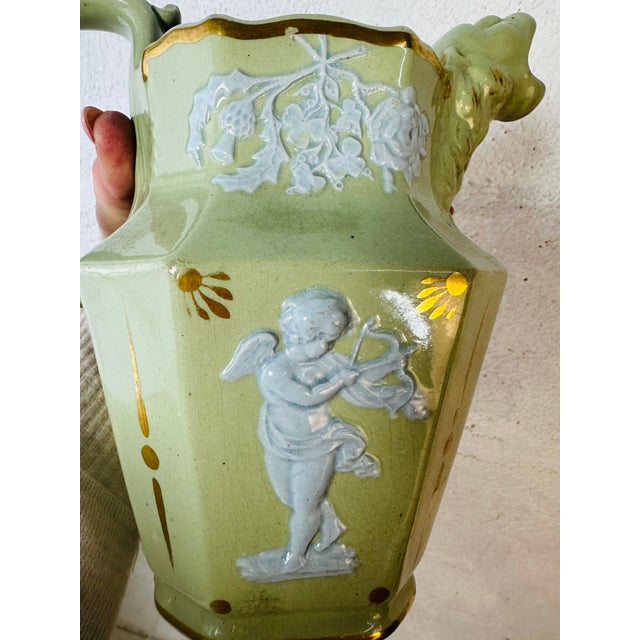 This is pure charm — whimsical, theatrical, and just a little mischievous. This vessel feels like it wandered out of a...