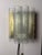 A masterful lighting object of German mid-century design: This wall lamp from Doria Leuchten combines elegant brass with...