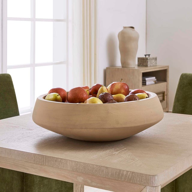 Crafted From Textured Earthenware, This Low-profile Bowl Features A Soft Putty Color, Creating A Versatile And Understated...