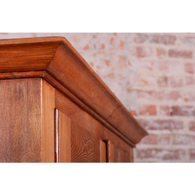 This monumental Neoclassical wardrobe represents the pinnacle of cabinetmaking in Bohemia at the beginning of the 19th...