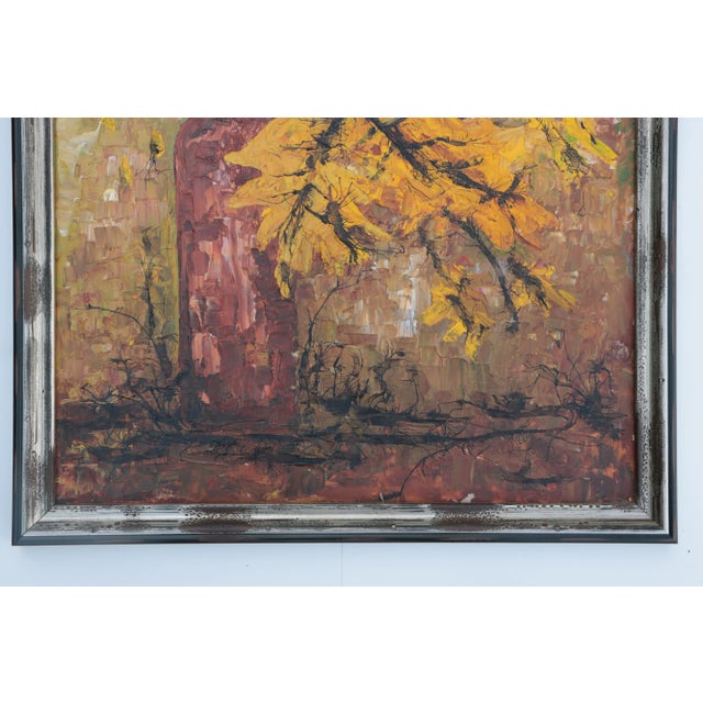 This heavily textured mid-century painting on canvas board features warm fall colors and black dendritic tendrils within...