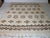 Hand-knotted Berber wool rug from Morocco, 1978. The rug is made of pure new wool and features a classic geometric pattern...