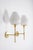 Elegant swedish mid-century wall lights in solid brass with opaline glass shades. The design is slender and well-balanced,...