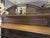 French Buffet two tier. Carved French Walnut with a marble top. The two doors are detailed with carved flower baskets....