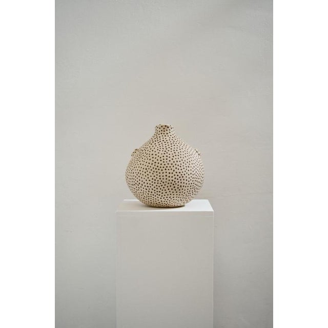 Le Tetraodon Beige Sandstone Vase by Lou Thomas Dimensions: ⌀ 30 x H 30 cm Materials: Beige sandstone