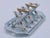 A superb vintage ceramic Art Deco style toast rack / letter holder. This unique letter rack has 4 slots for plenty of...