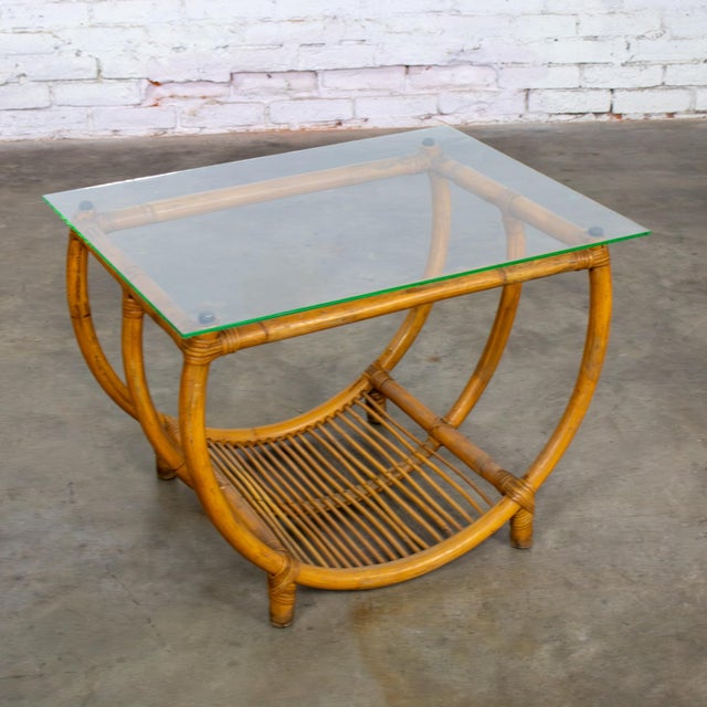 Wonderful vintage MCM (a.k.a. Mid-Century Modern) Coastal or Island style side or end table composed of a U or crescent...