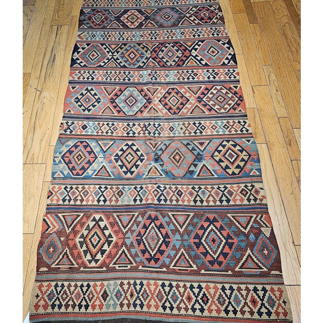 This striking 19th century Caucasian Kazak kilim is a superb example of traditional tribal flatweaving from the southern...