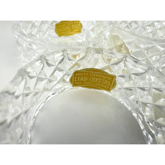 This refined set of six lead crystal napkin rings by Phil Papel, crafted in West Germany, showcases exceptional artistry...