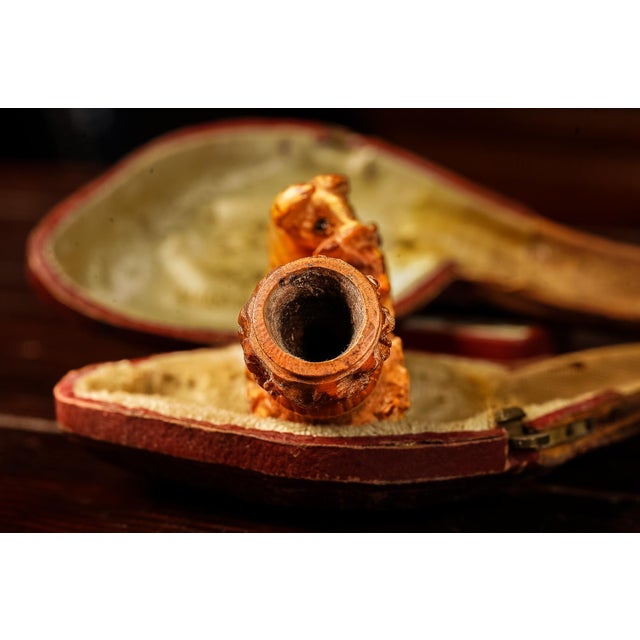 Vintage Genuine Meerschaum tobacco pipe. Pipe measures 1"W x 2.75"L. Case measures 2.5"W x 5.5"L. This tobacco pipe...