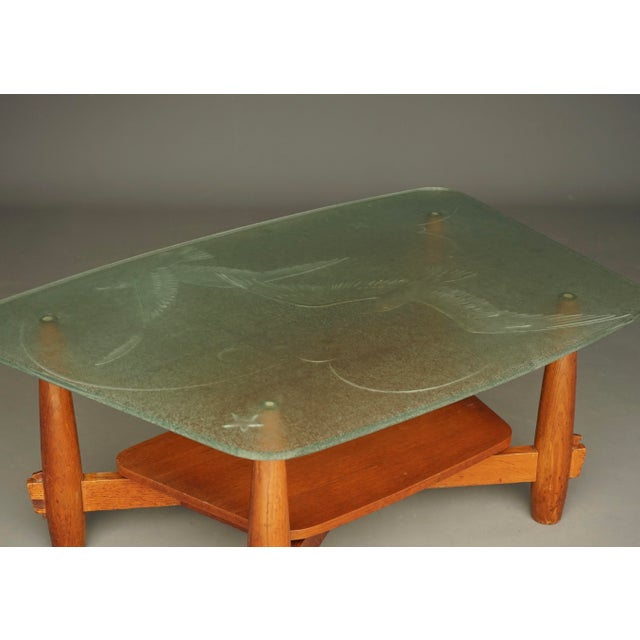 Unique coffee table that seems to combine both Art Deco and Brutalist styles. The piece is a successful combination of the...
